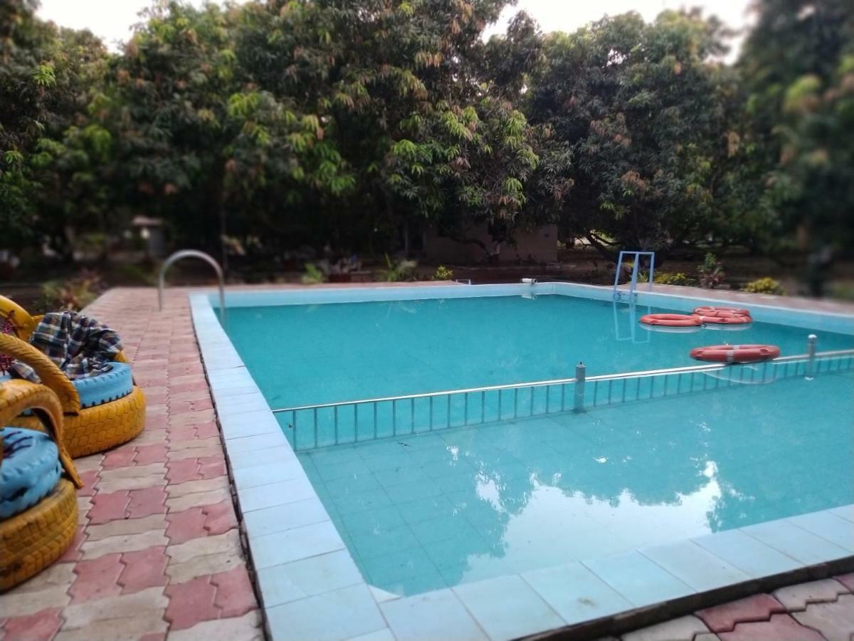Hôtel Shiv Farm House à Sasan Gir Extérieur photo